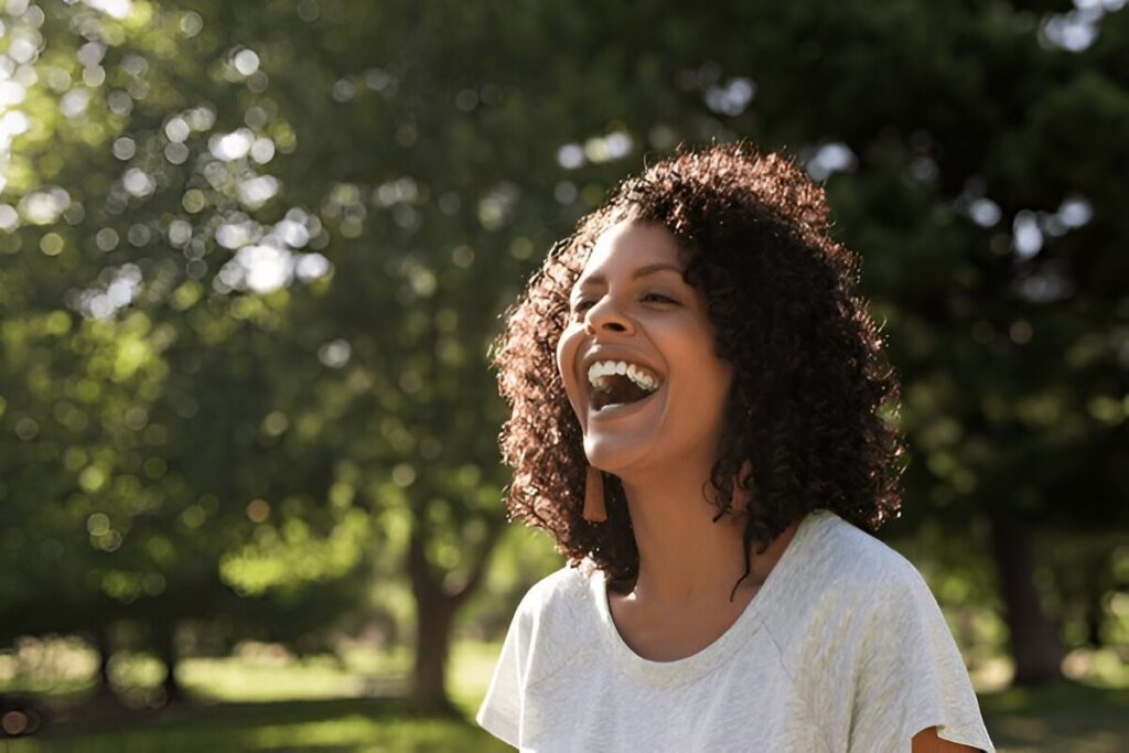 Happy woman enjoying life after alcohol recovery