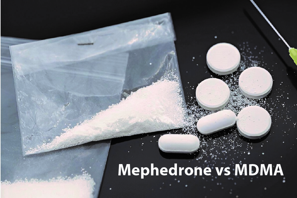 A white pills and powder next to a bag of white powder