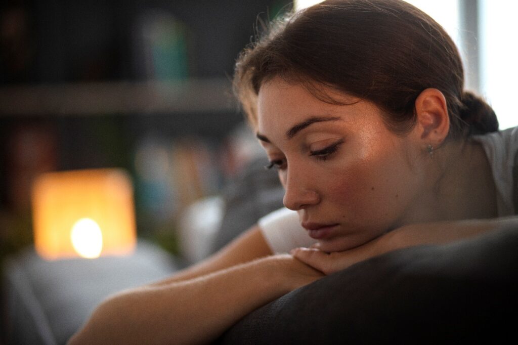 A person looking down at her chin