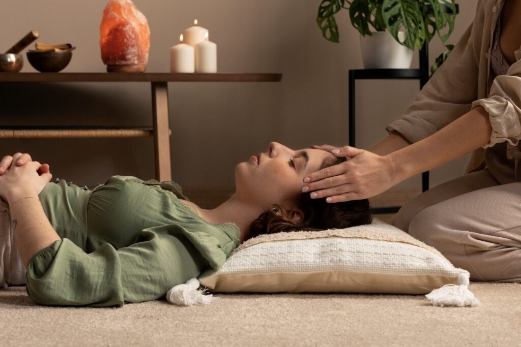A person lying on the floor with her head on the ground