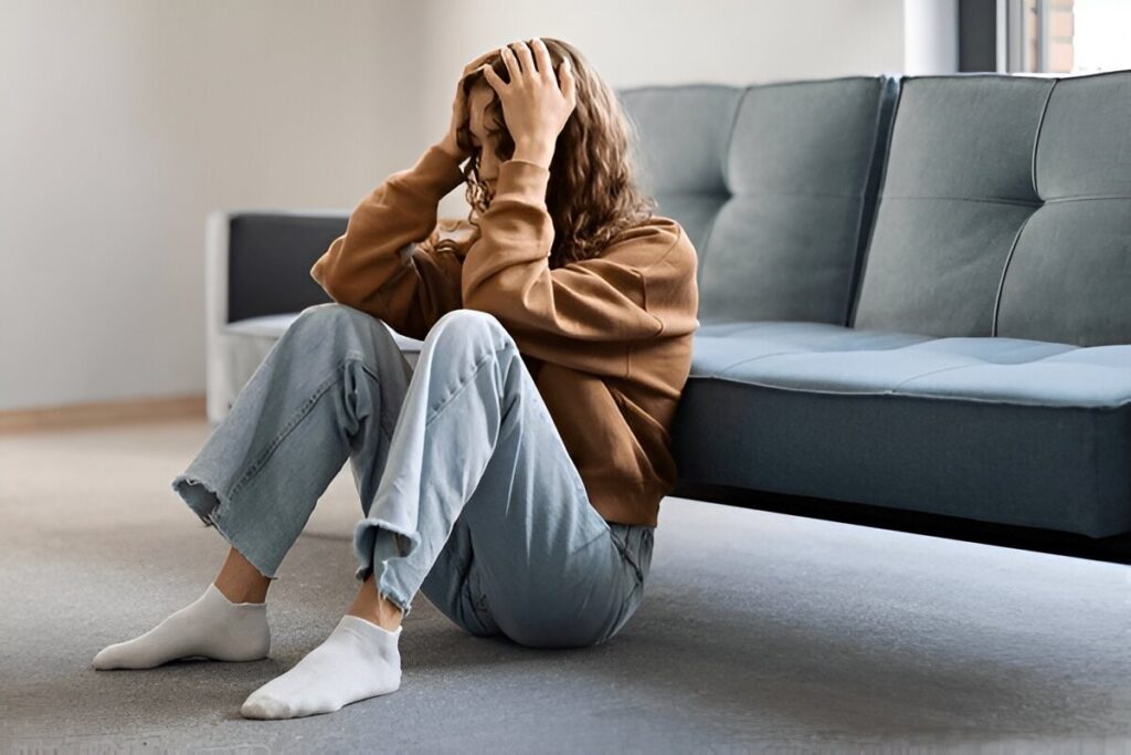 A person sitting on the floor
